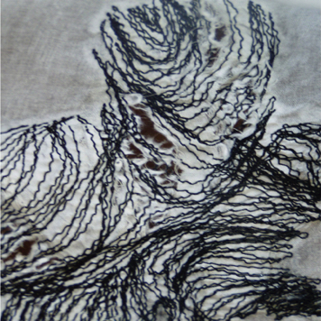 detail – machine embroidery and chlorine on cotton lawn panel